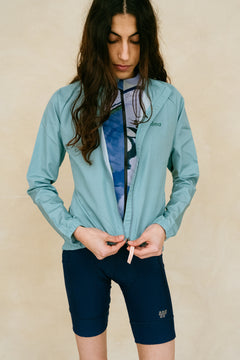 Women's cycling windbreaker in turquoise #color_Turquoise