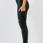 Cuissard long d'hiver Alba sans bretelles noir montrant les poches vue de profil