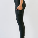 Cuissard long d'hiver Alba sans bretelles noir montrant les poches vue de profil