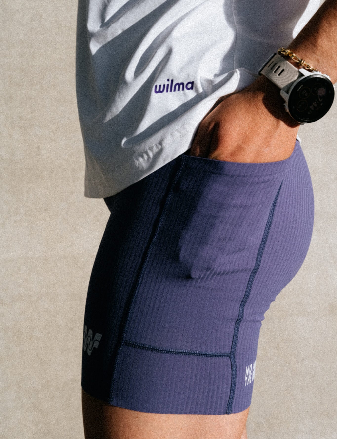 Détail de la poche latérale du short de running femme Nina violet - Wilma